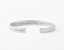 The Inner Wave Bracelet placed horizontal in Sterling Silver thumbnail