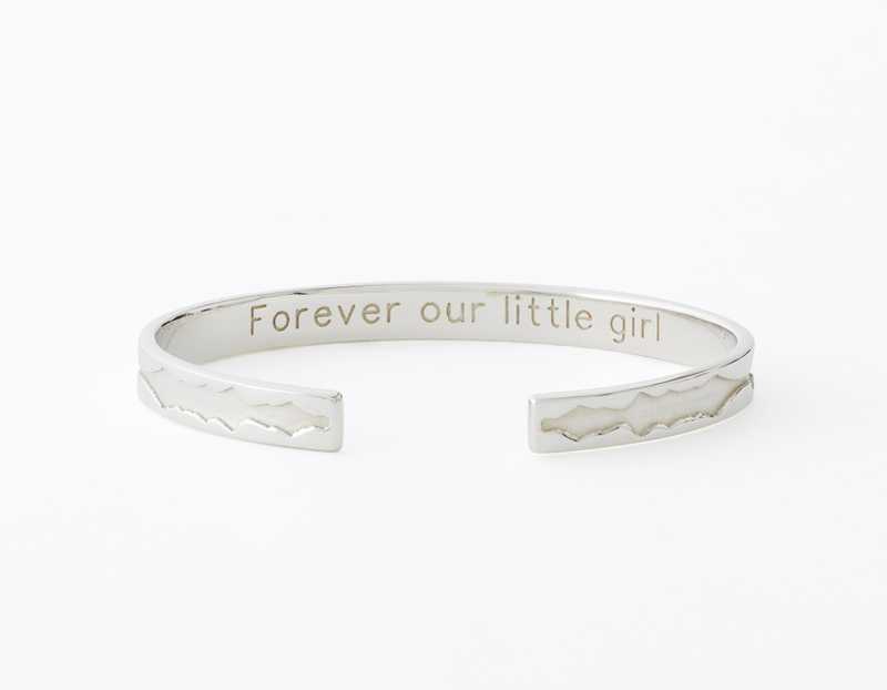 The Outer Wave Bracelet placed horizontal-inner in Sterling Silver