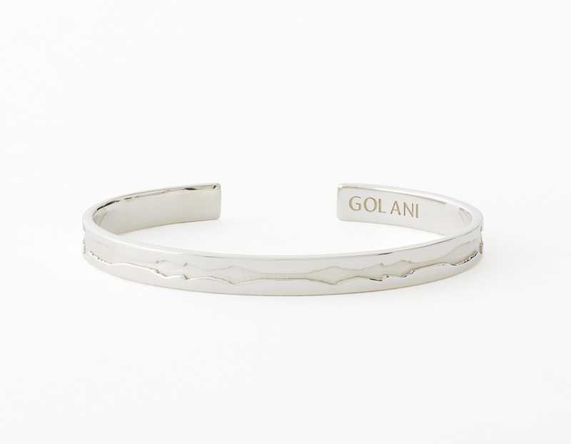 The Outer Wave Bracelet placed horizontal in Sterling Silver