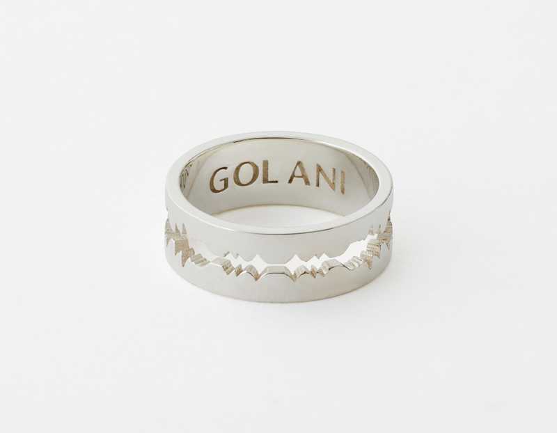 The Cut Wave Ring placed horizontal in Sterling Silver